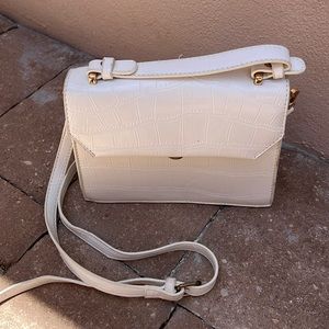 White crossbody bag.